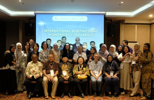 A group photo with participants at the pre-conference workshop